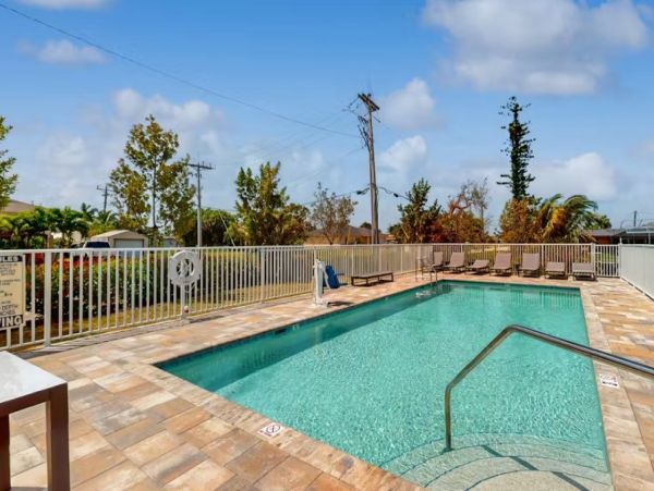 Canal-front Condo with Saltwater Pool and Boat Slip in Cape Coral