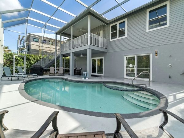 Canal Front Four Bedroom Charming Home in Bonita Beach