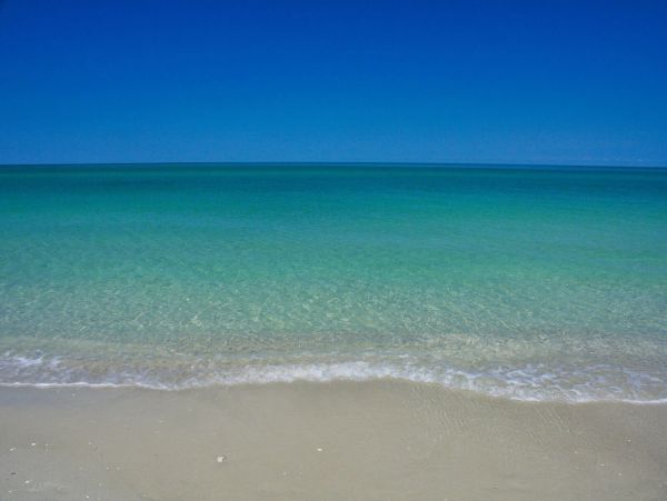 Two Bedroom Vacation Condo Walk to Beach in Naples