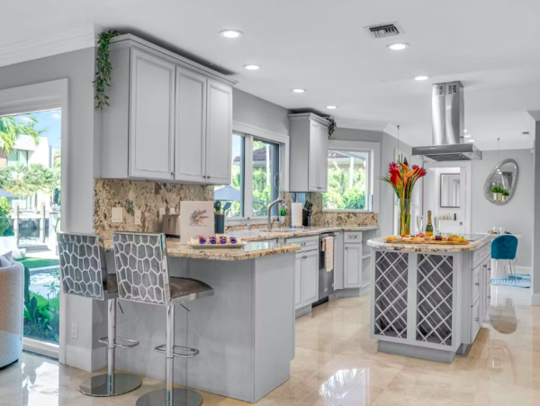 Stylish Waterfront Escape with Heated Pool, Games Room & Dock Access