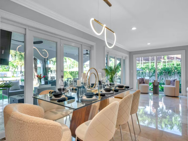 Stylish Waterfront Escape with Heated Pool, Games Room & Dock Access