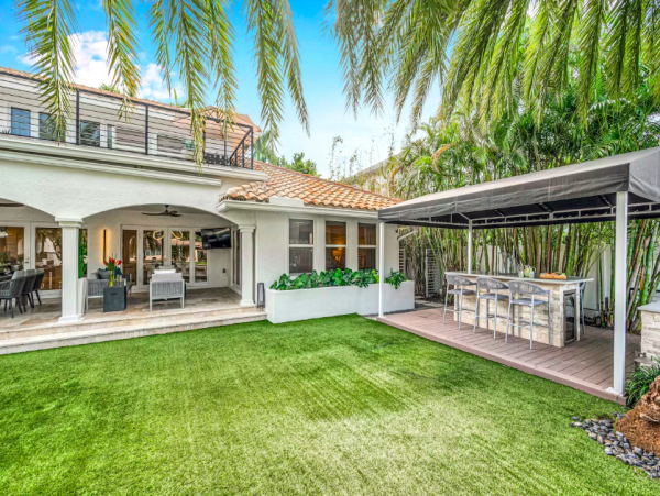 Stylish Waterfront Escape with Heated Pool, Games Room & Dock Access