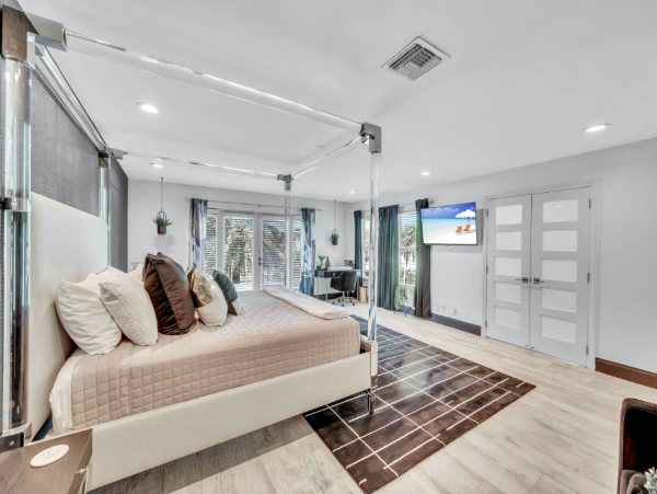 Stylish Waterfront Escape with Heated Pool, Games Room & Dock Access