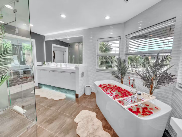Stylish Waterfront Escape with Heated Pool, Games Room & Dock Access