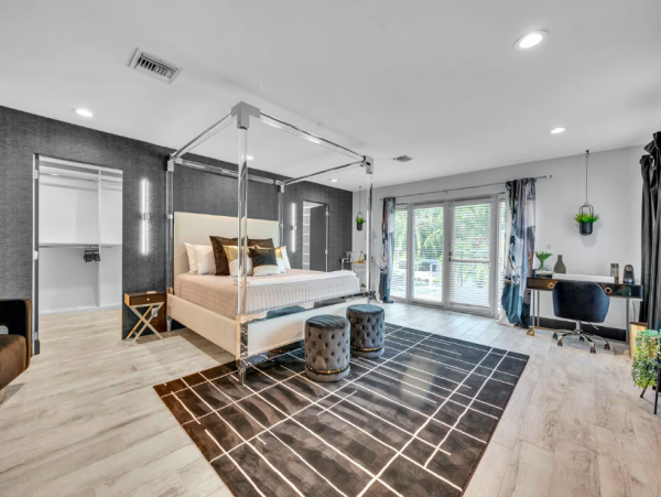 Stylish Waterfront Escape with Heated Pool, Games Room & Dock Access