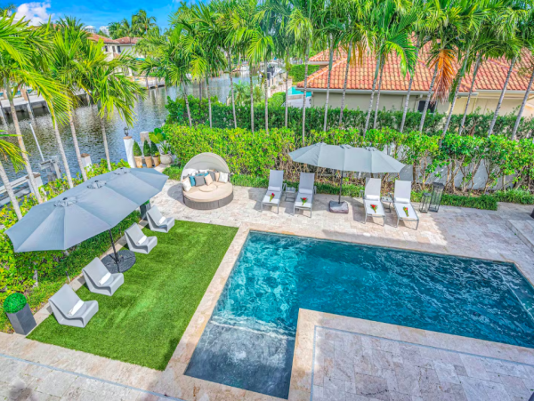 Stylish Waterfront Escape with Heated Pool, Games Room & Dock Access