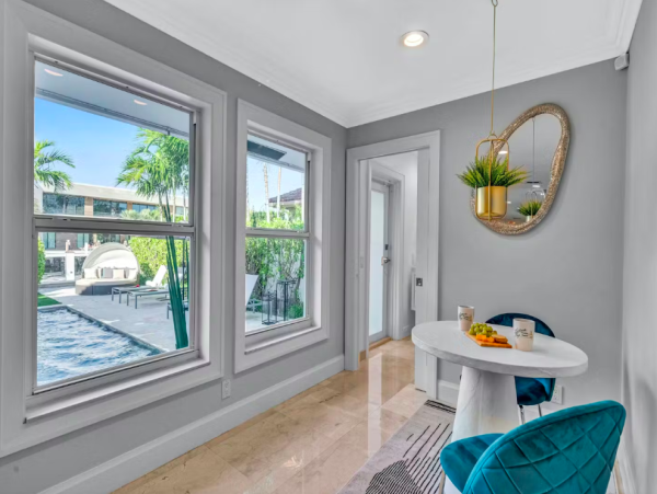 Stylish Waterfront Escape with Heated Pool, Games Room & Dock Access