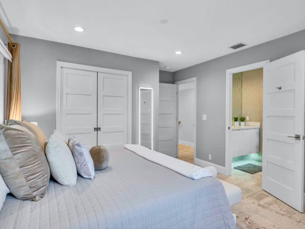 Stylish Waterfront Escape with Heated Pool, Games Room & Dock Access