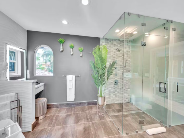 Stylish Waterfront Escape with Heated Pool, Games Room & Dock Access