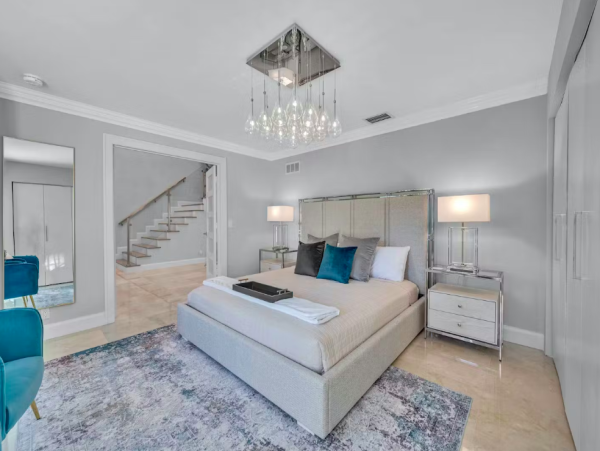 Stylish Waterfront Escape with Heated Pool, Games Room & Dock Access