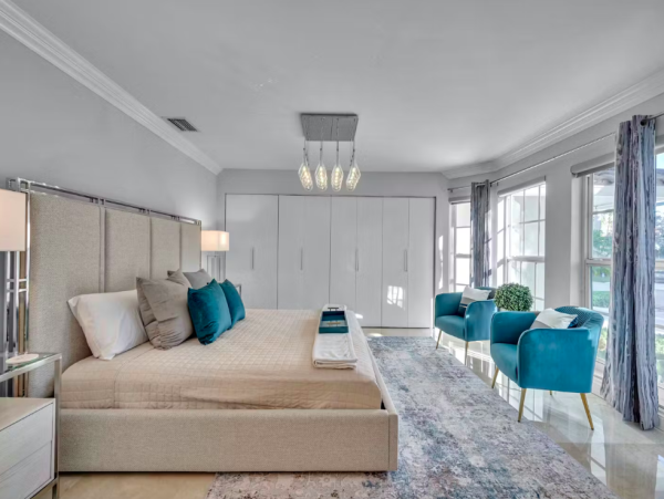 Stylish Waterfront Escape with Heated Pool, Games Room & Dock Access