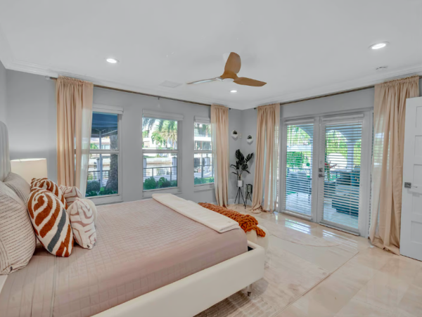 Stylish Waterfront Escape with Heated Pool, Games Room & Dock Access