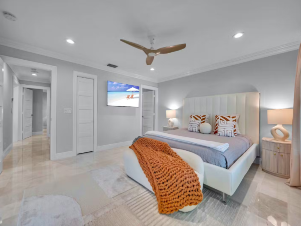 Stylish Waterfront Escape with Heated Pool, Games Room & Dock Access