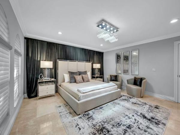 Stylish Waterfront Escape with Heated Pool, Games Room & Dock Access