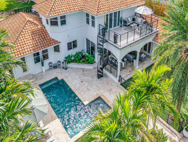 Stylish Waterfront Escape with Heated Pool, Games Room & Dock Access