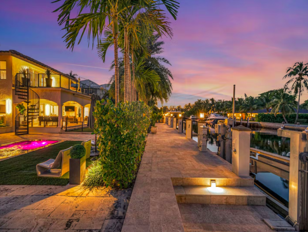 Stylish Waterfront Escape with Heated Pool, Games Room & Dock Access