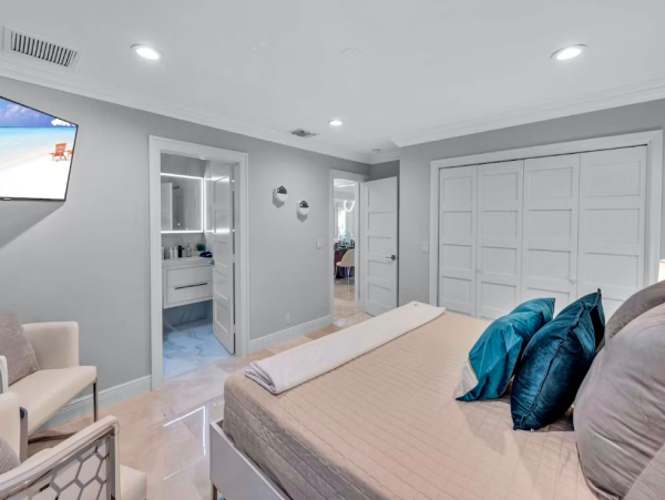 Stylish Waterfront Escape with Heated Pool, Games Room & Dock Access