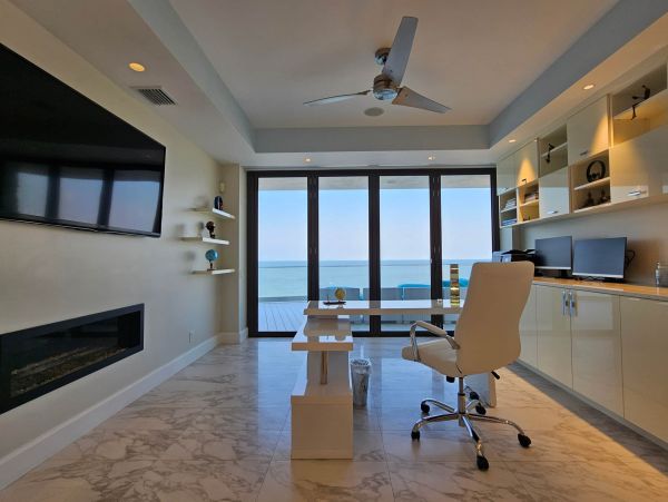 Five Bedroom Beachfront Treasure Island Vacation Home with Pool & Stunning Views