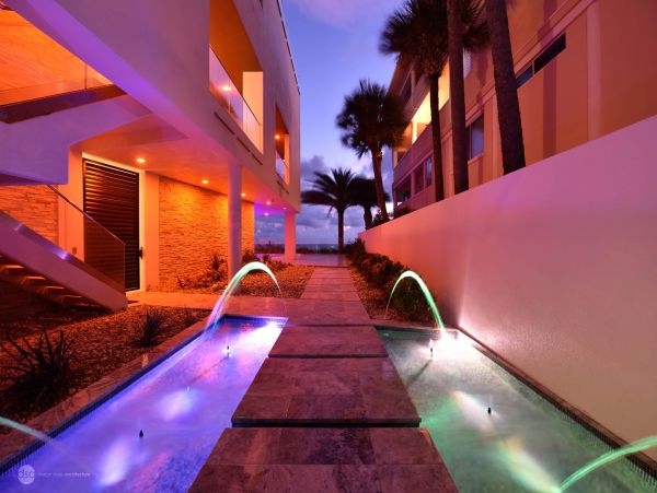 Five Bedroom Beachfront Treasure Island Vacation Home with Pool & Stunning Views