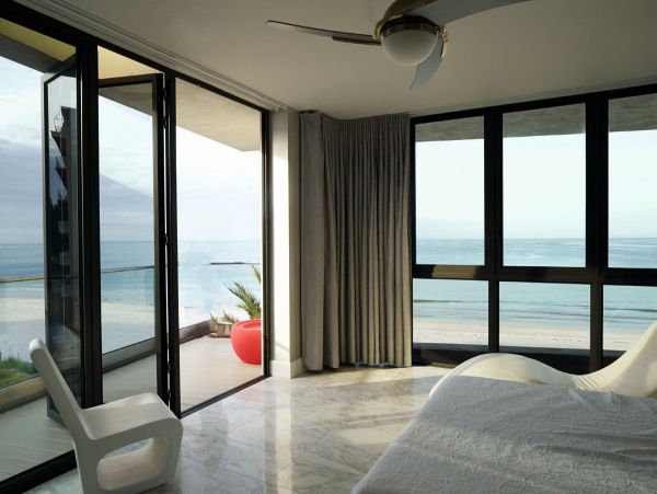 Five Bedroom Beachfront Treasure Island Vacation Home with Pool & Stunning Views