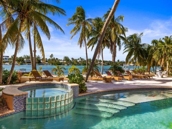 Cayman Kai Luxury Vacation Rental Beachfront Estate with Pool & Dock