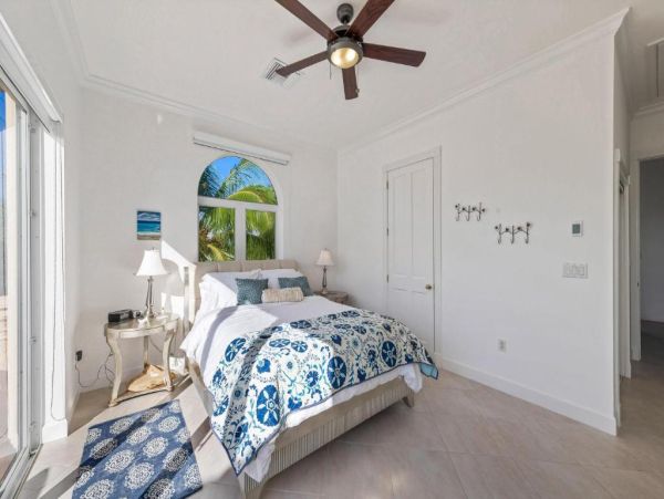 Cayman Kai Luxury Vacation Rental Beachfront Estate with Pool & Dock