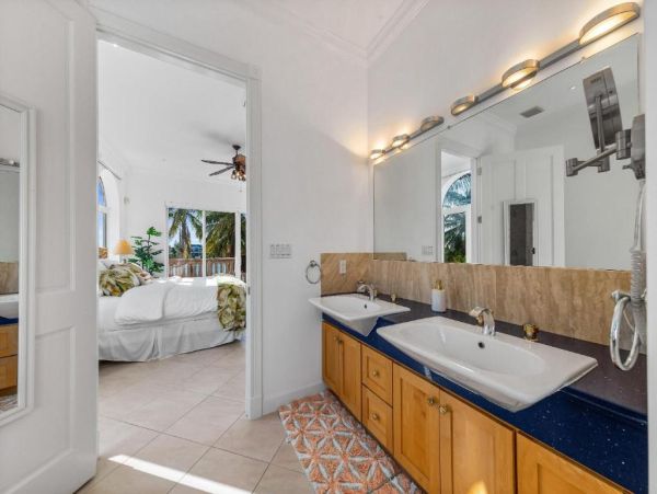 Cayman Kai Luxury Vacation Rental Beachfront Estate with Pool & Dock