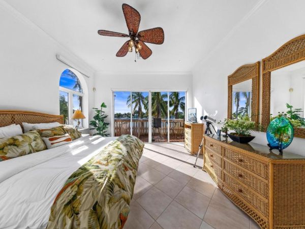 Cayman Kai Luxury Vacation Rental Beachfront Estate with Pool & Dock