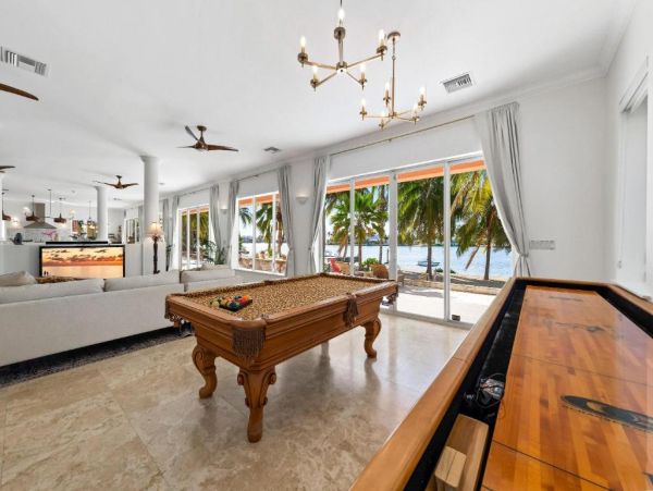 Cayman Kai Luxury Vacation Rental Beachfront Estate with Pool & Dock