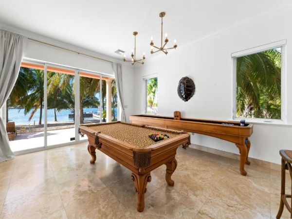 Cayman Kai Luxury Vacation Rental Beachfront Estate with Pool & Dock
