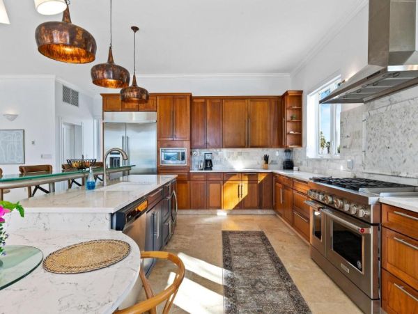 Cayman Kai Luxury Vacation Rental Beachfront Estate with Pool & Dock