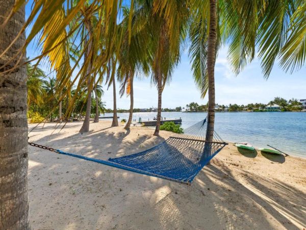 Cayman Kai Luxury Vacation Rental Beachfront Estate with Pool & Dock
