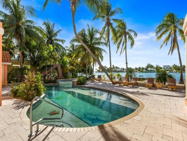 Cayman Kai Luxury Vacation Rental Beachfront Estate with Pool & Dock