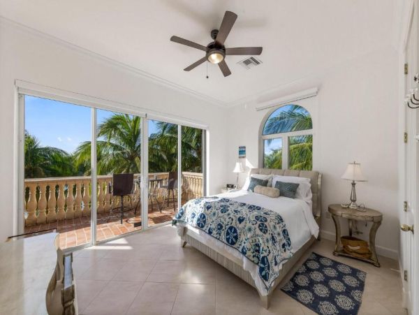 Cayman Kai Luxury Vacation Rental Beachfront Estate with Pool & Dock