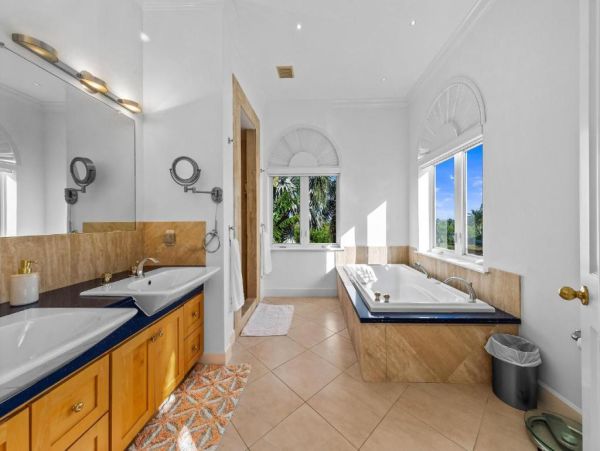 Cayman Kai Luxury Vacation Rental Beachfront Estate with Pool & Dock