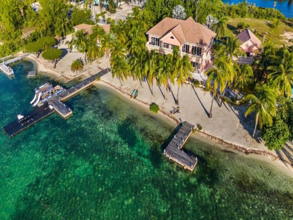 Cayman Kai Luxury Vacation Rental Beachfront Estate with Pool & Dock