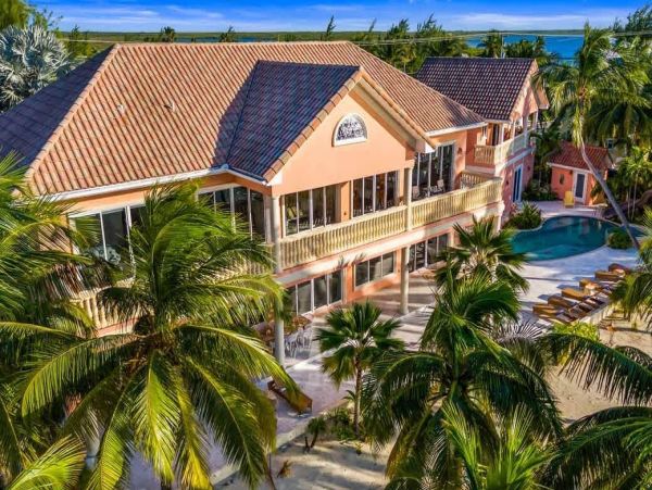 Cayman Kai Luxury Vacation Rental Beachfront Estate with Pool & Dock