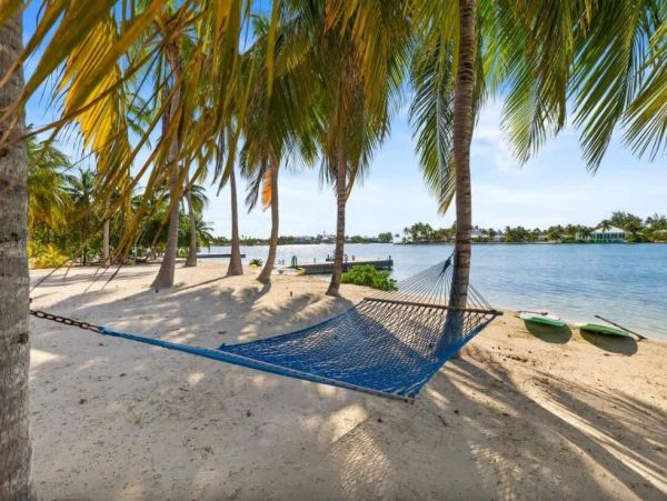 Cayman Kai Luxury Vacation Rental Beachfront Estate with Pool & Dock