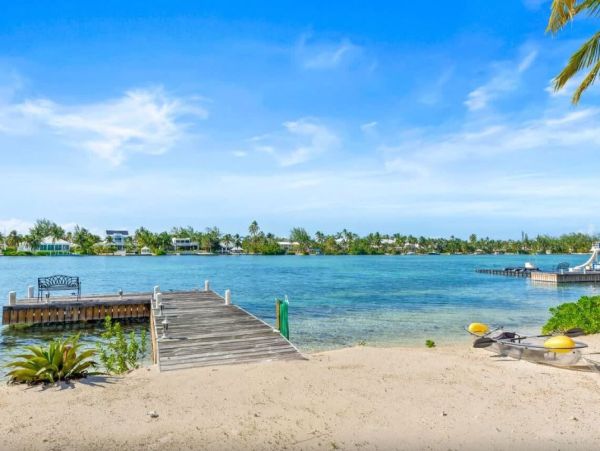 Cayman Kai Luxury Vacation Rental Beachfront Estate with Pool & Dock