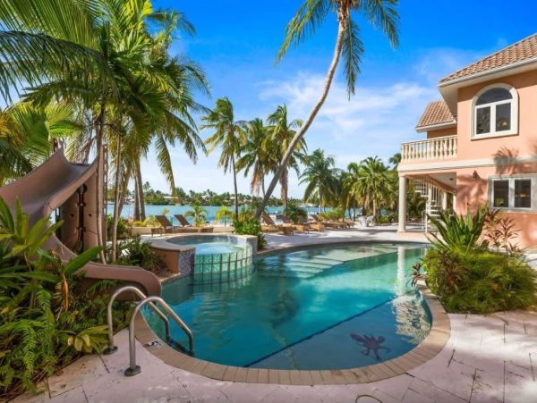 Cayman Kai Luxury Vacation Rental Beachfront Estate with Pool & Dock