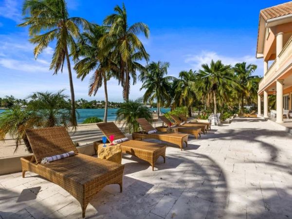 Cayman Kai Luxury Vacation Rental Beachfront Estate with Pool & Dock