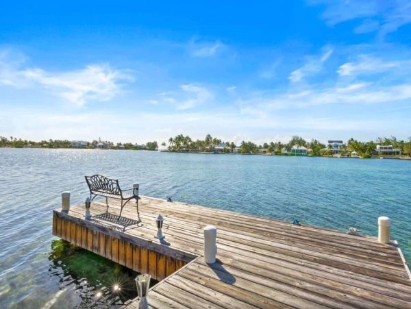 Cayman Kai Luxury Vacation Rental Beachfront Estate with Pool & Dock