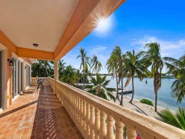 Cayman Kai Luxury Vacation Rental Beachfront Estate with Pool & Dock