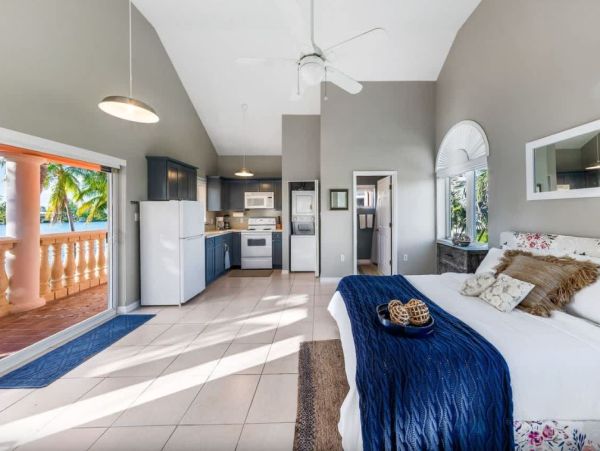 Cayman Kai Luxury Vacation Rental Beachfront Estate with Pool & Dock