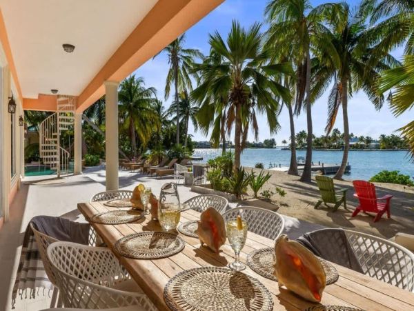 Cayman Kai Luxury Vacation Rental Beachfront Estate with Pool & Dock