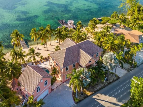 Cayman Kai Luxury Vacation Rental Beachfront Estate with Pool & Dock