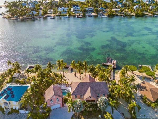 Cayman Kai Luxury Vacation Rental Beachfront Estate with Pool & Dock