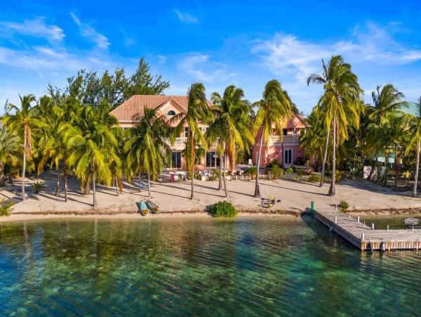 Cayman Kai Luxury Vacation Rental Beachfront Estate with Pool & Dock
