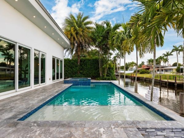 Fort Lauderdale Waterfront Vacation Rental - Luxury 4-Bed Canal-Front Home with Pool