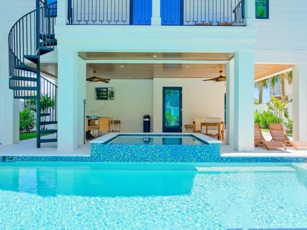 Anna Maria Island Luxury Vacation Rental Beachfront Home with Pool & Rooftop Deck